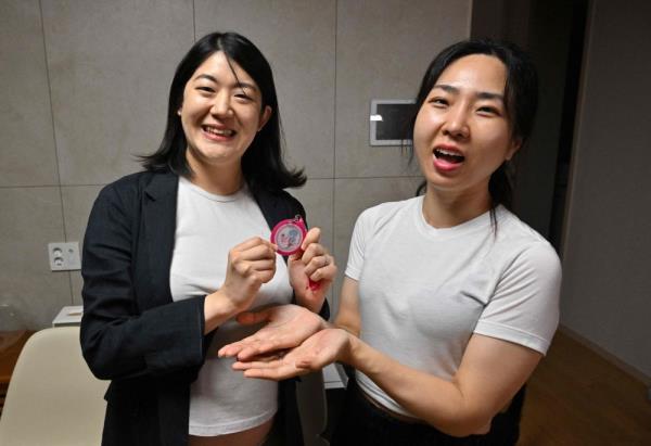 ‘Happy mothers’: South Korean couple beat same-sex barriers to parenthood